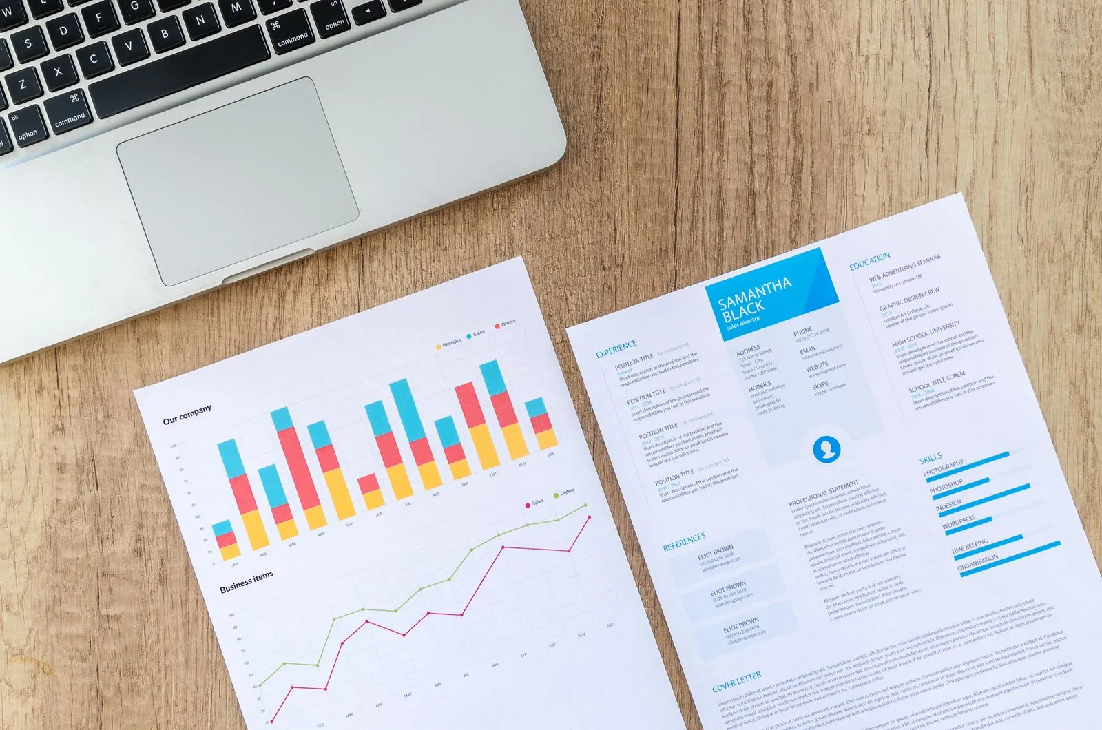 Budget charts and laptop for planning cleaning services costs