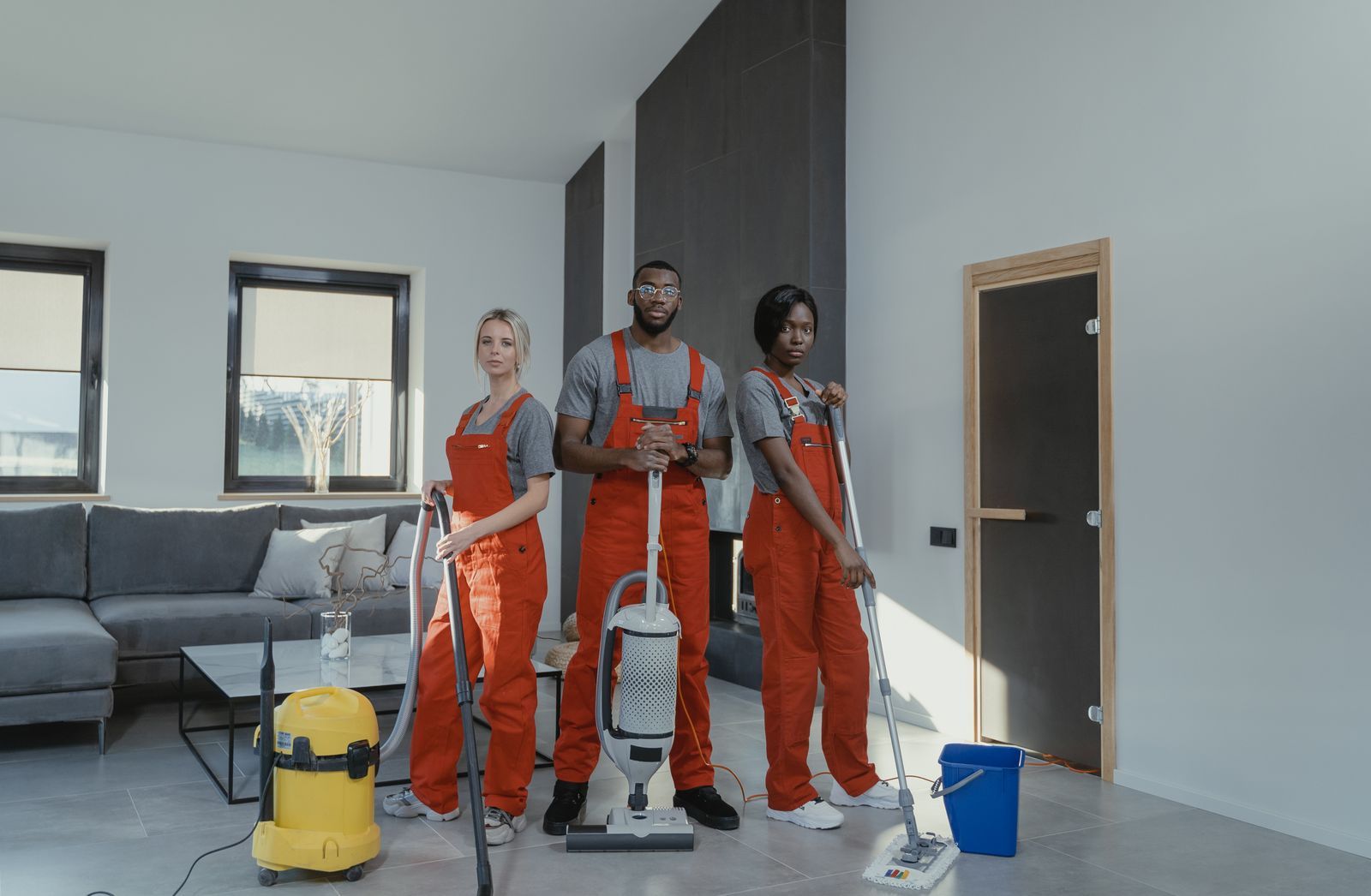 TotalMGT-style professional cleaning team with equipment