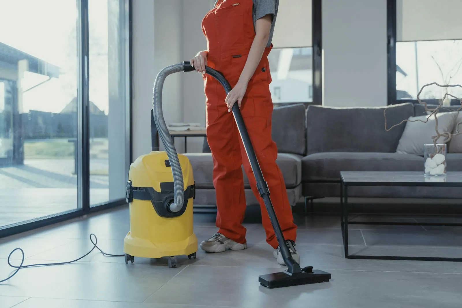 Vacuuming a downtown living and lounge area