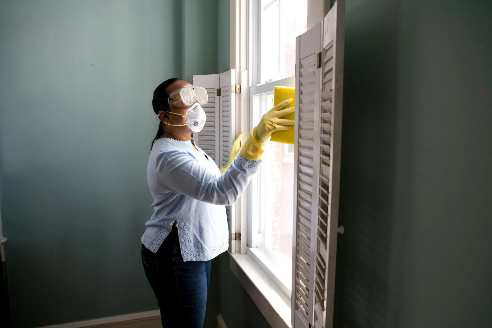 Detail cleaning of historic window shutters